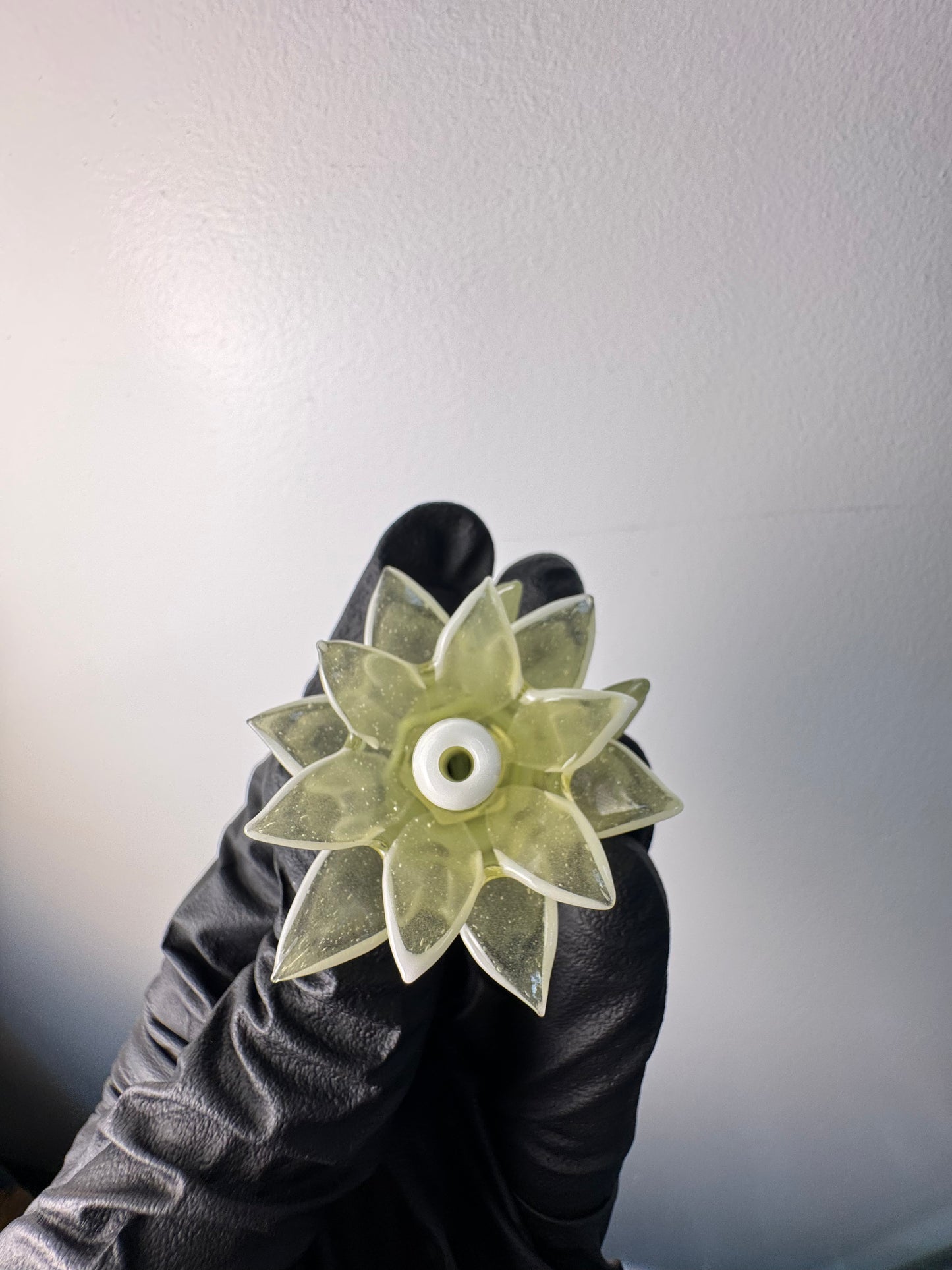 Unparalleled Glass Flower Pivot Top