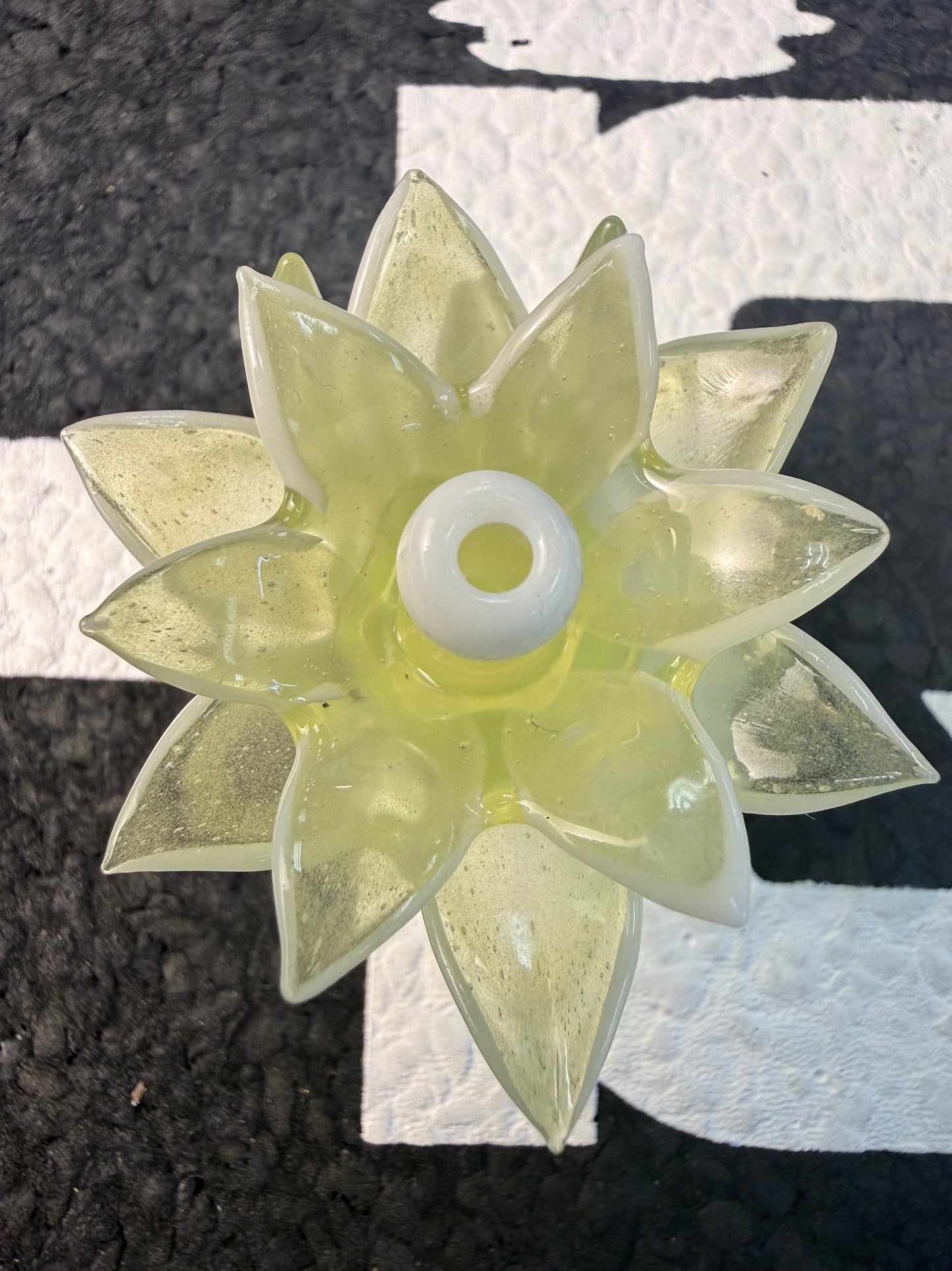 Unparalleled Glass Flower Pivot Top