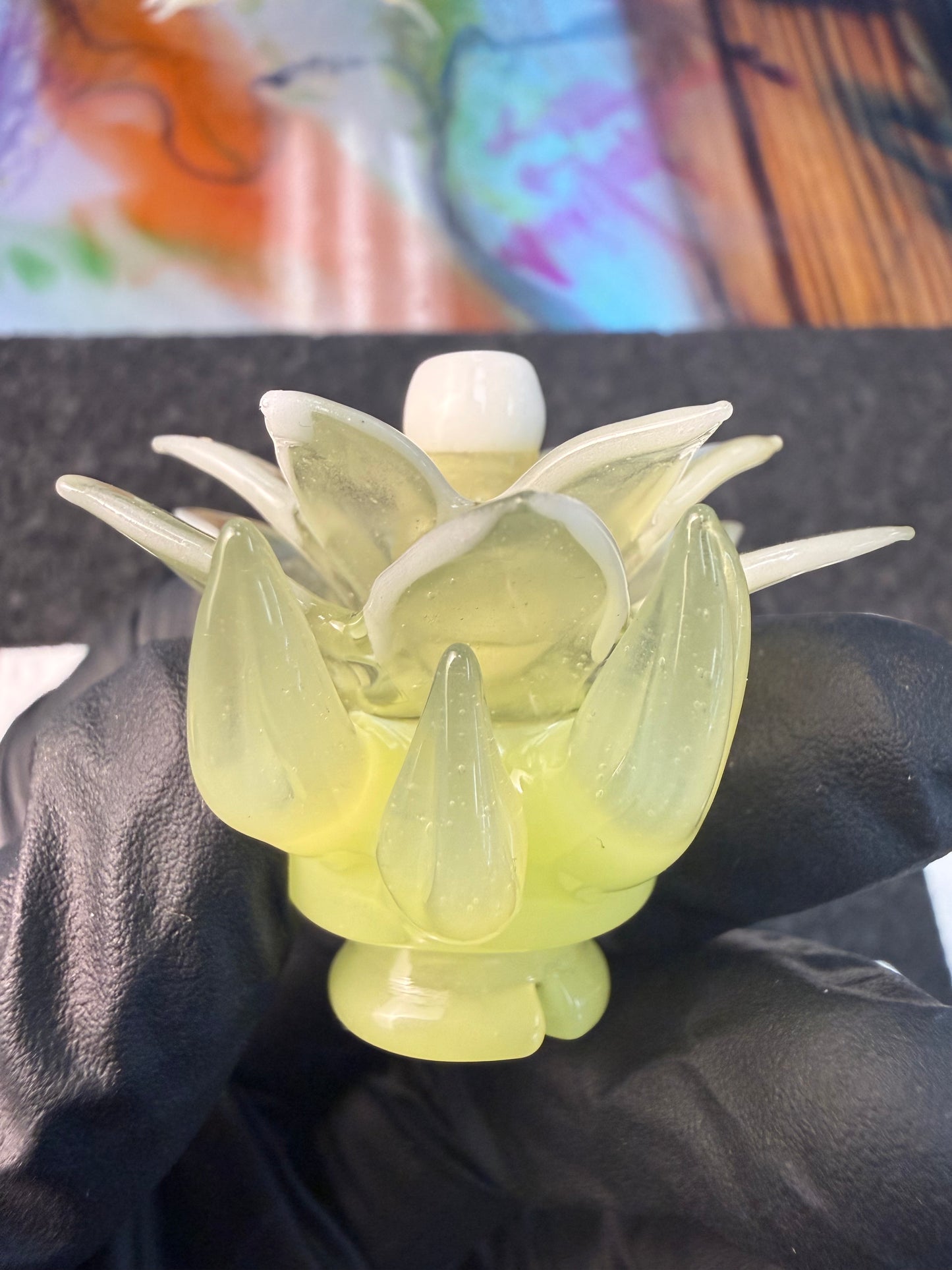 Unparalleled Glass Flower Pivot Top